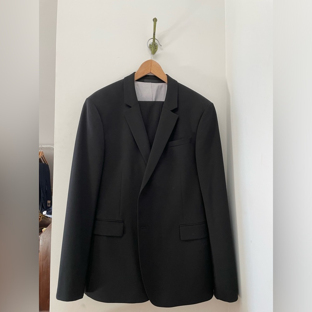 Top man black suit